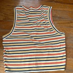 Two tanks in one! One is white and the other is a colorful button up tanktop